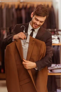 businessman-looking-choosing-classical-suit-suit-shop